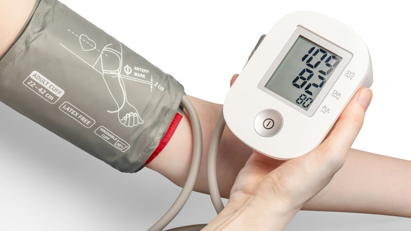 Digital blood pressure monitor cuff representing cardiovascular effects of Armodafinil