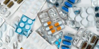 Pile of medication tablets representing Armodafinil dosage guidance