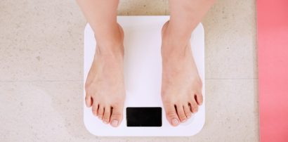 Digital bathroom scale representing weight and appetite changes on Armodafinil