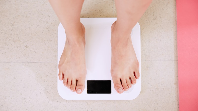 Digital bathroom scale representing weight and appetite changes on Armodafinil