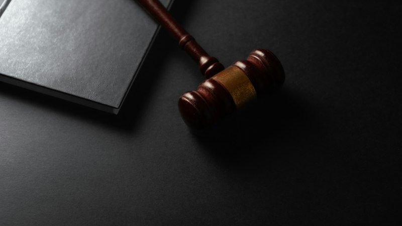 Gavel and law book representing the legal status of Armodafinil