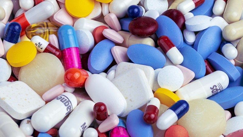 Colorful medication tablets representing a brand comparison of Armodafinil products
