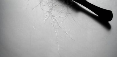 Comb with strands of hair representing male pattern hair loss treatment with Finasteride