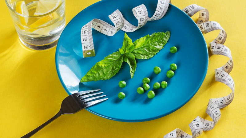 Healthy vegetables and measuring tape representing weight loss with Semaglutide